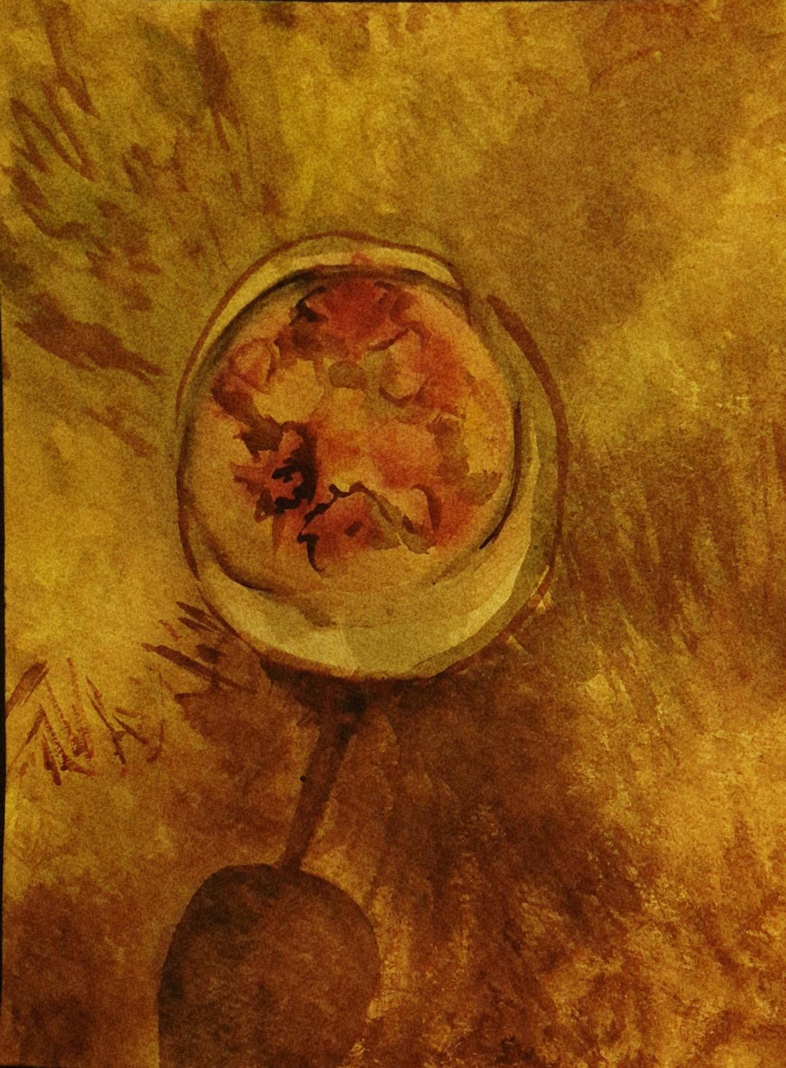 A small bowl of red and yellow forms sits within a glowing ochre field, with a long dark shadow extending downwards.